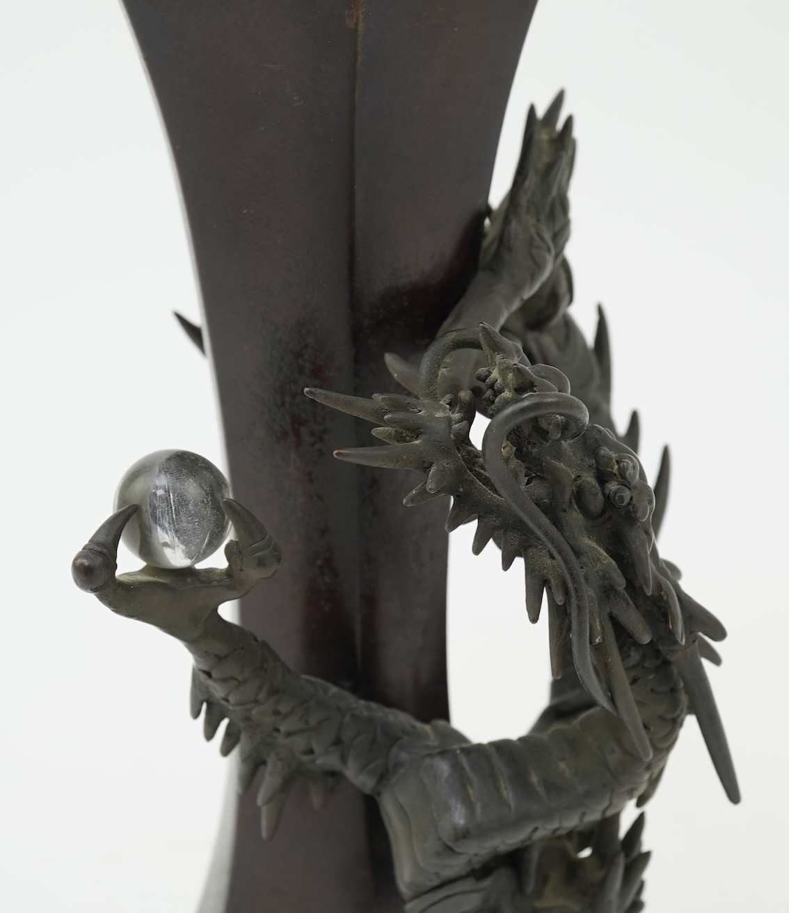 A Japanese bronze 'dragon' hexagonal beaker vase, Meiji period
